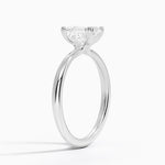 Freesia Triple-Prong Solitaire Ring Platinum Emerald Engagement Ring
