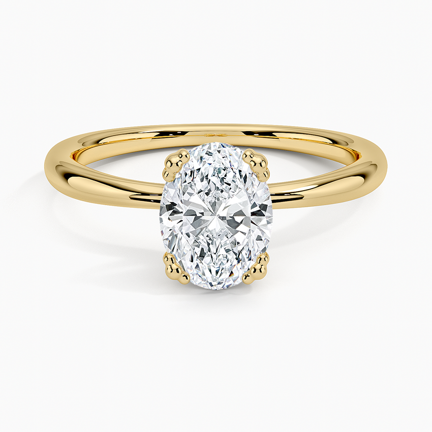 Freesia Triple-Prong Solitaire Ring Yellow Gold 18k Oval Engagement Ring