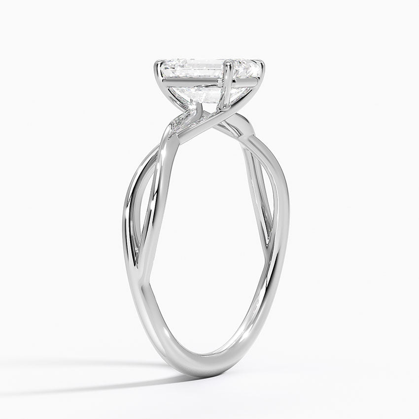 Alya Twist Solitaire Ring Platinum Emerald Engagement Ring