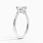 Petite Cometa Three Stone Diamond Ring Platinum Emerald Engagement Ring
