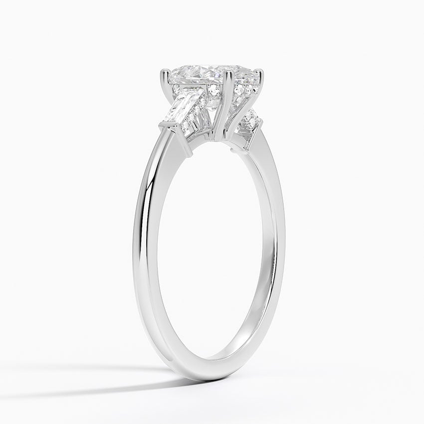 Adorned Tapered Baguette Three Stone Diamond Ring Platinum Oval Engagement Ring